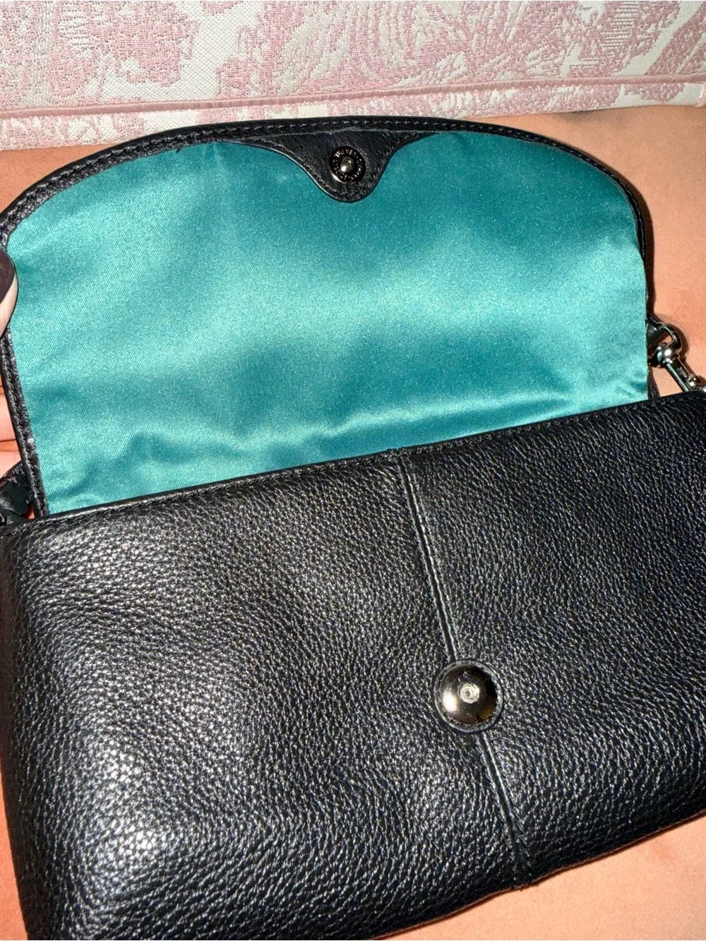Black leather coach wristlet